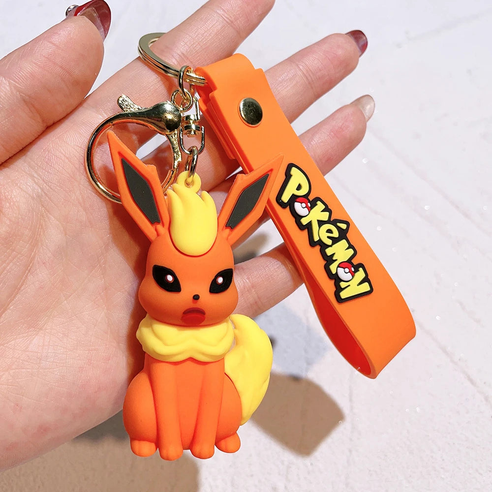 Pokémon Big Eevee Family Keychain Gift Set, Complete Evolution PVC Keychain with Pokéball Clip, Adorable Key Ring for Kid