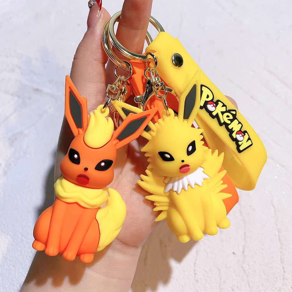 Pokémon Big Eevee Family Keychain Gift Set, Complete Evolution PVC Keychain with Pokéball Clip, Adorable Key Ring for Kid