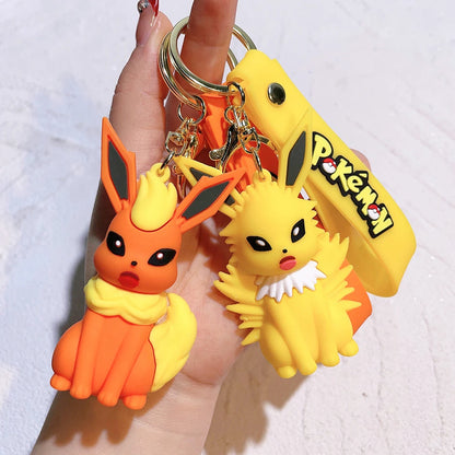 Pokémon Big Eevee Family Keychain Gift Set, Complete Evolution PVC Keychain with Pokéball Clip, Adorable Key Ring for Kid