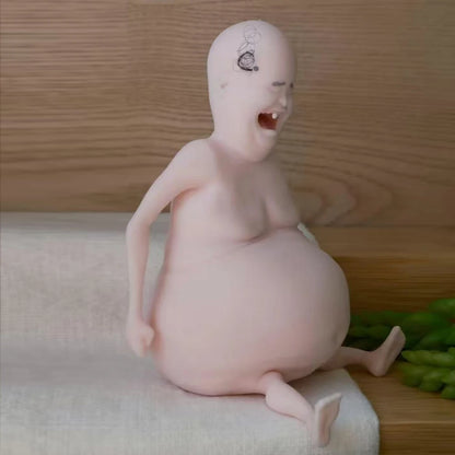 Rene Ren é is a Bald Pinched Funny Figurine Stress Relieving Toy Funny Doll with a sticky and Happy smile Ugly doll