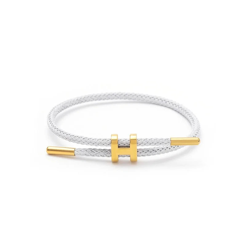 The multi-functional, fashionable and elegant H-buckle stainless steel rope women's bracelet is suitable for men's charming brac