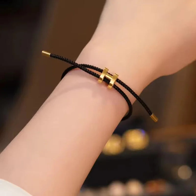 The multi-functional, fashionable and elegant H-buckle stainless steel rope women's bracelet is suitable for men's charming brac