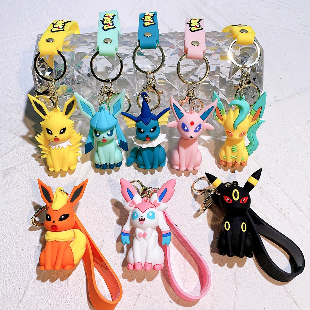 Pokémon Big Eevee Family Keychain Gift Set, Complete Evolution PVC Keychain with Pokéball Clip, Adorable Key Ring for Kid