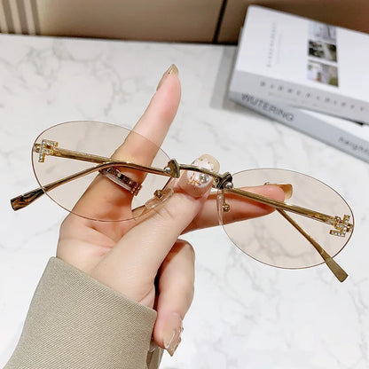 Fashion Oval Frameless Sunglasses Women Sparkling Rhinestone F Design Luxury Sun Glasses Girls shopping travelling eyeglasses